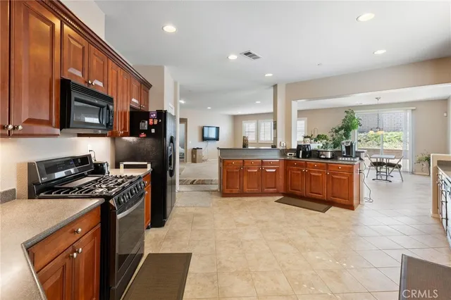 a view of a workspace with furniture