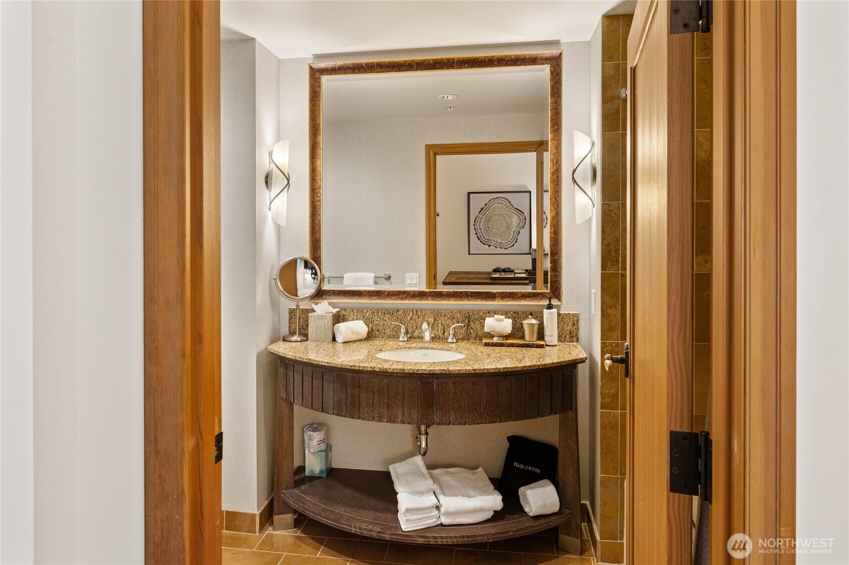 3600 Suncadia Trail, Unit 4049 Cle Elum, WA 98922 - Photo 16 of 26 a room with a mirror and a sink