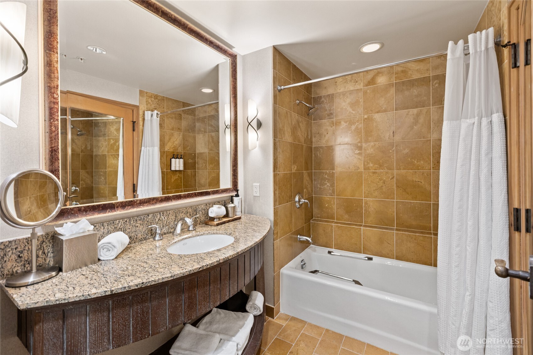 3600 Suncadia Trail, Unit 4049 Cle Elum, WA 98922 - Photo 17 of 26 a bathroom with a granite countertop sink mirror and bathtub