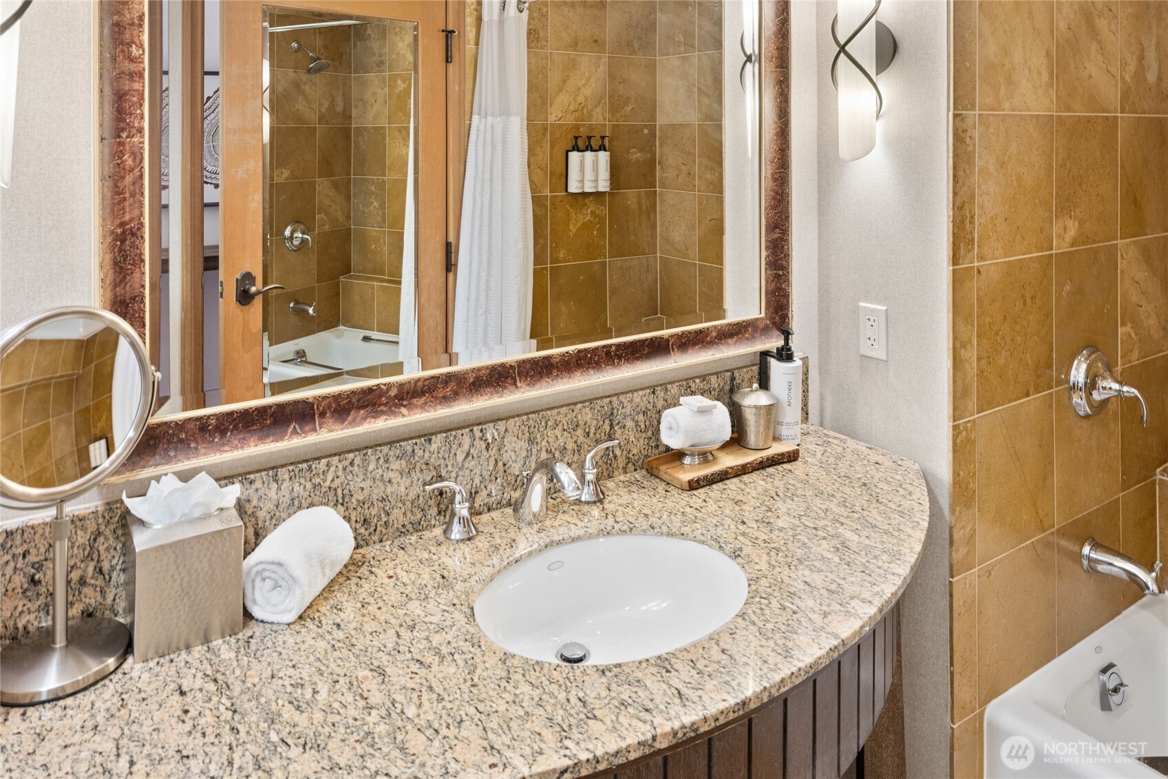 3600 Suncadia Trail, Unit 4049 Cle Elum, WA 98922 - Photo 18 of 26 a bathroom with a granite countertop sink and a mirror