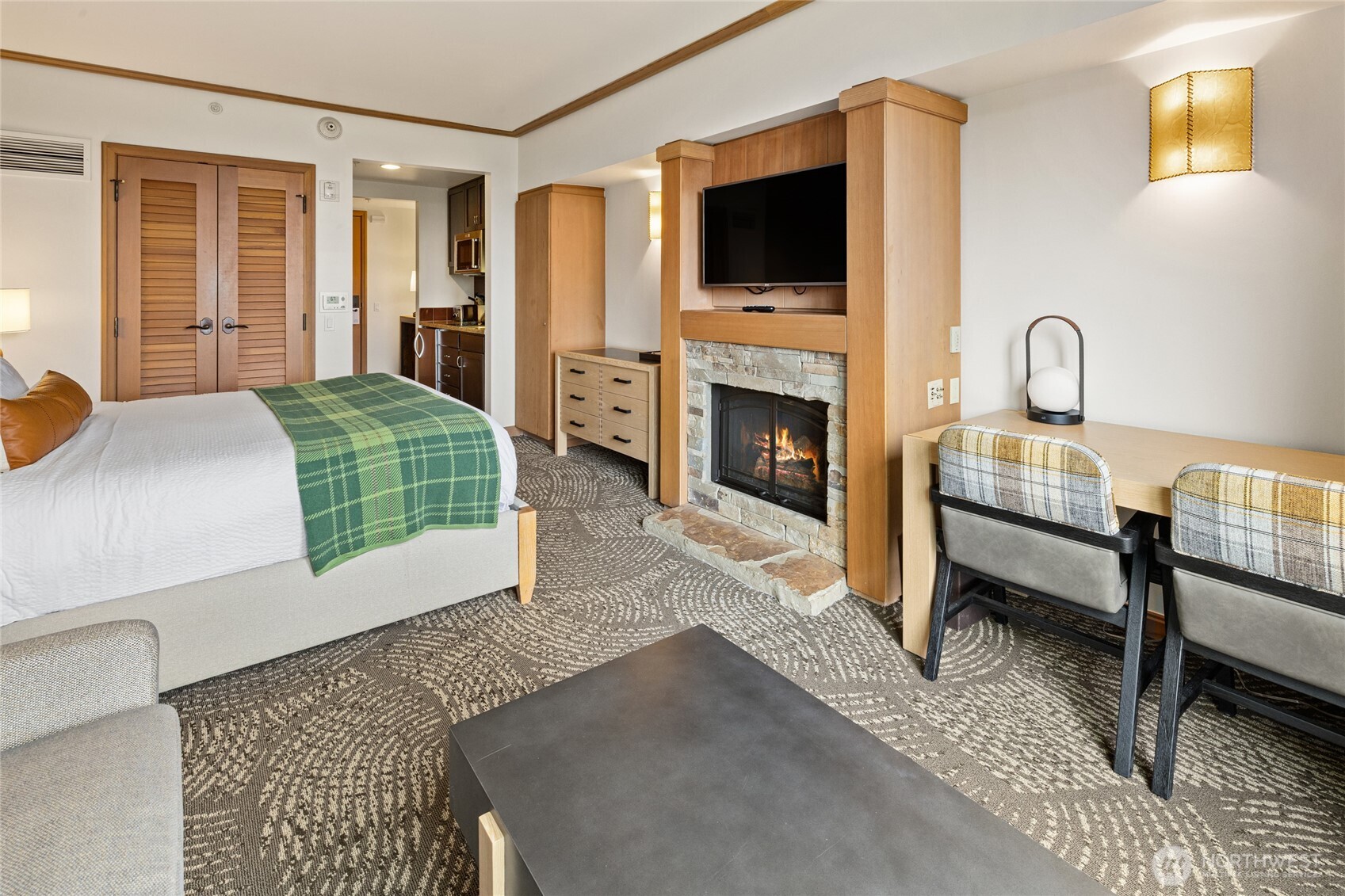 3600 Suncadia Trail, Unit 4049 Cle Elum, WA 98922 - Photo 23 of 26 a living room with furniture and a fireplace