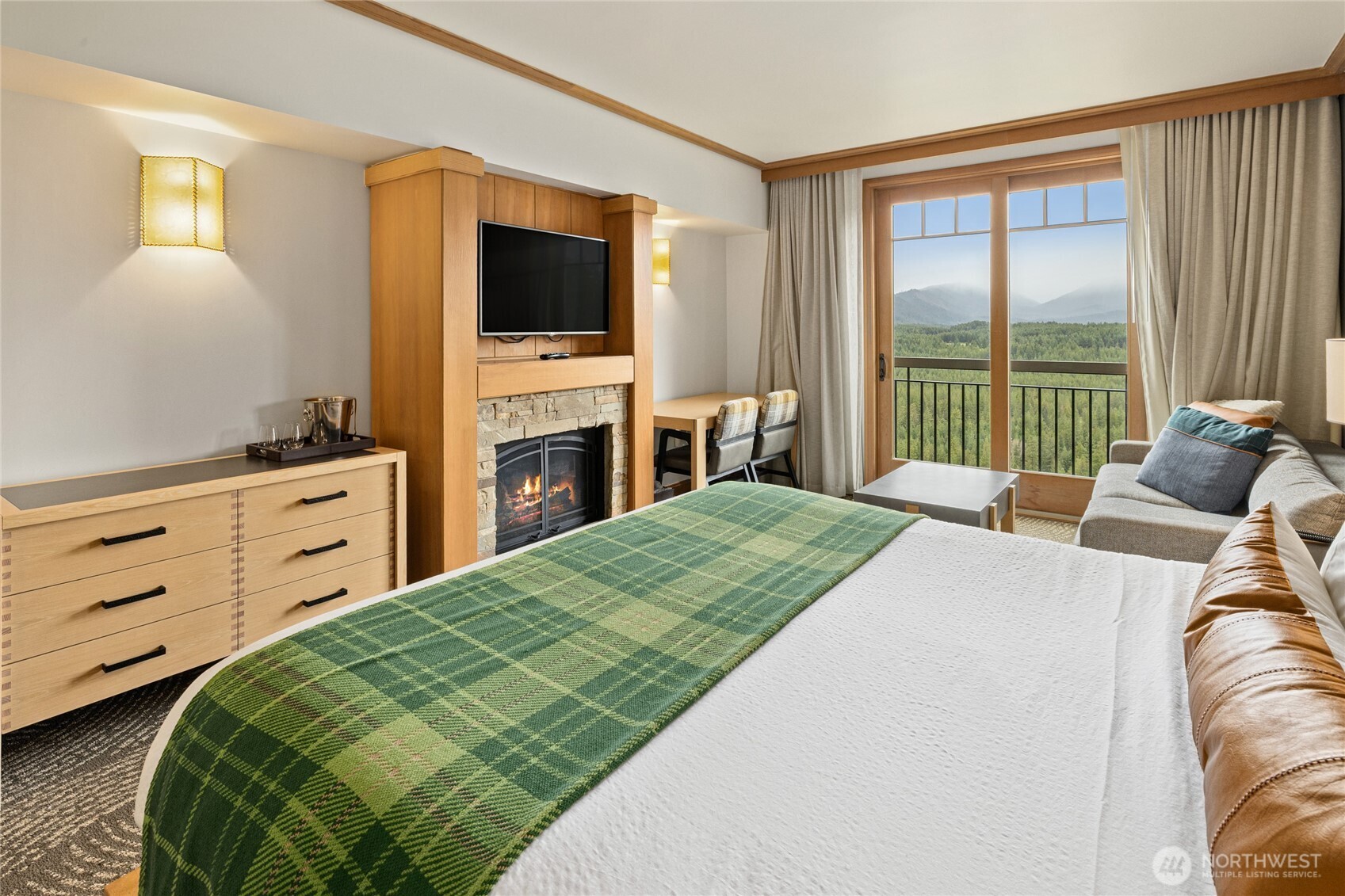 3600 Suncadia Trail, Unit 4049 Cle Elum, WA 98922 - Photo 6 of 26 a bedroom with a bed and a flat screen tv