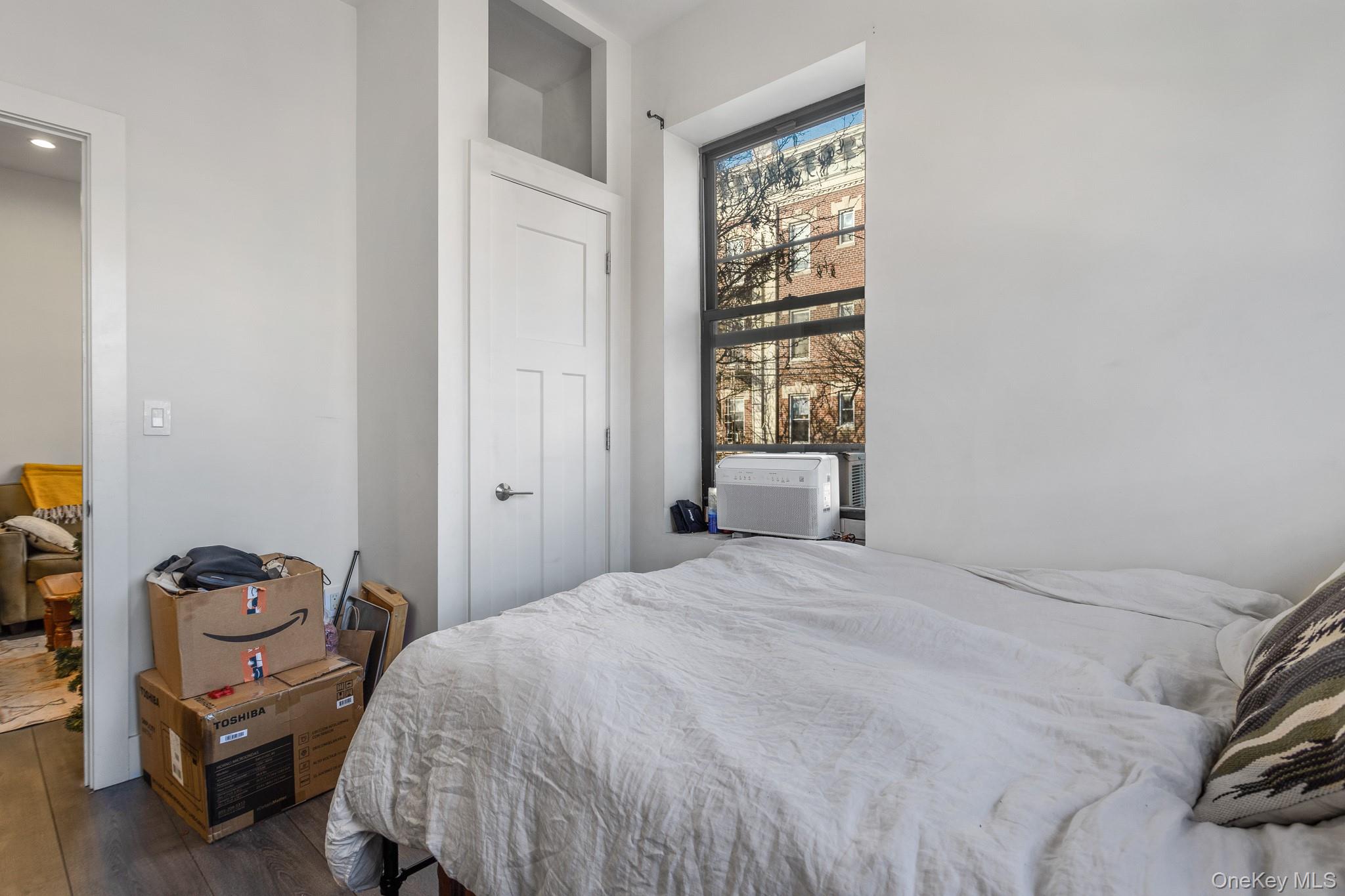 68-51 Fresh Pond Road, Unit 2B Queens, NY 11385 - Photo 11 of 15 Bedroom with wood finished floors