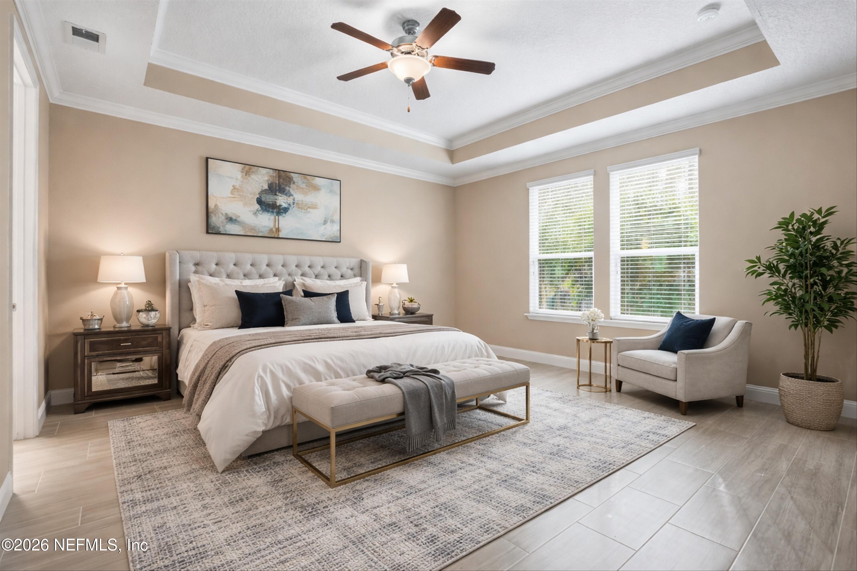 309 Coco Point St. Augustine, FL 32092 - Photo 20 of 50 a bedroom with a bed and a couch