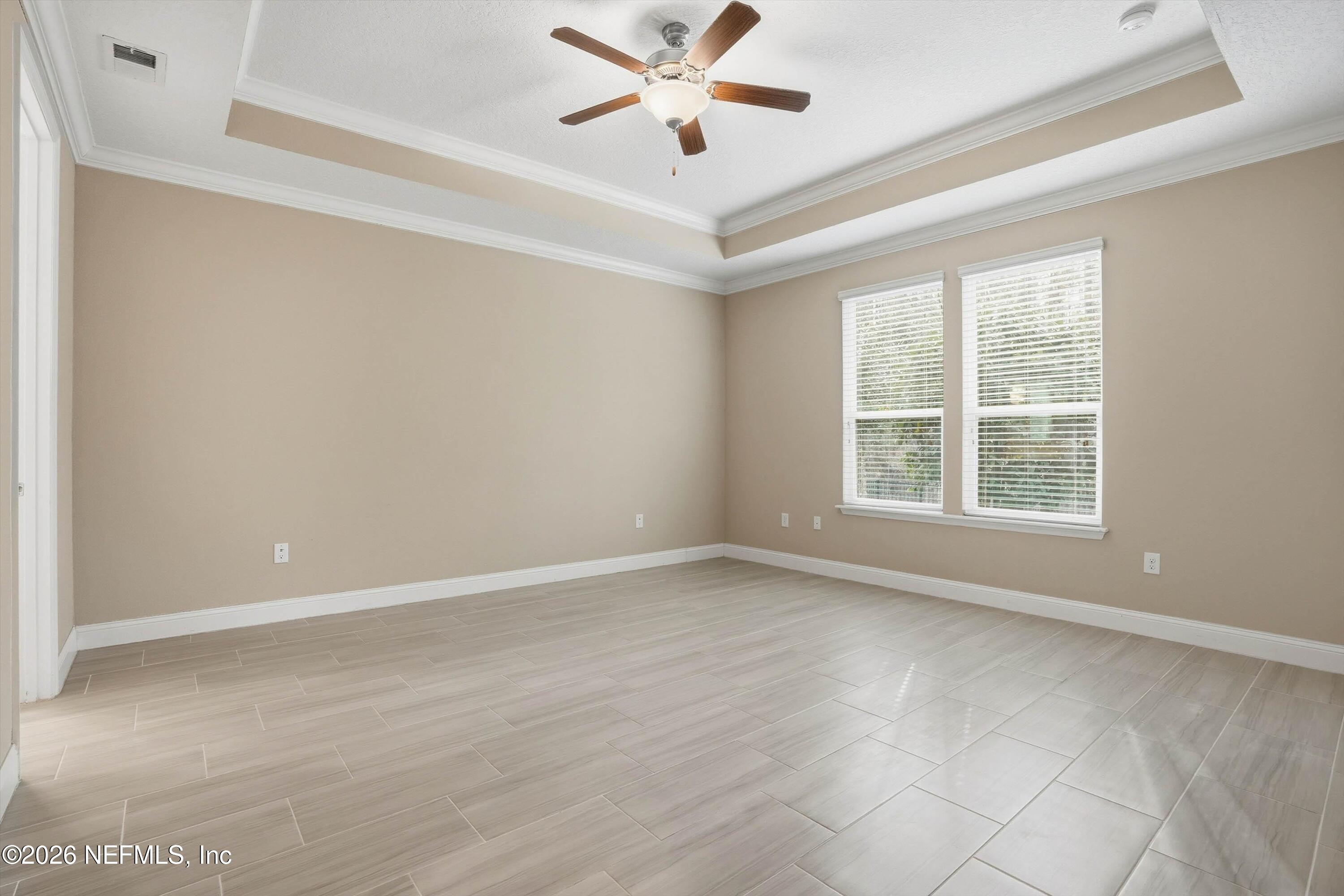 309 Coco Point St. Augustine, FL 32092 - Photo 21 of 50 a view of an empty room with a window