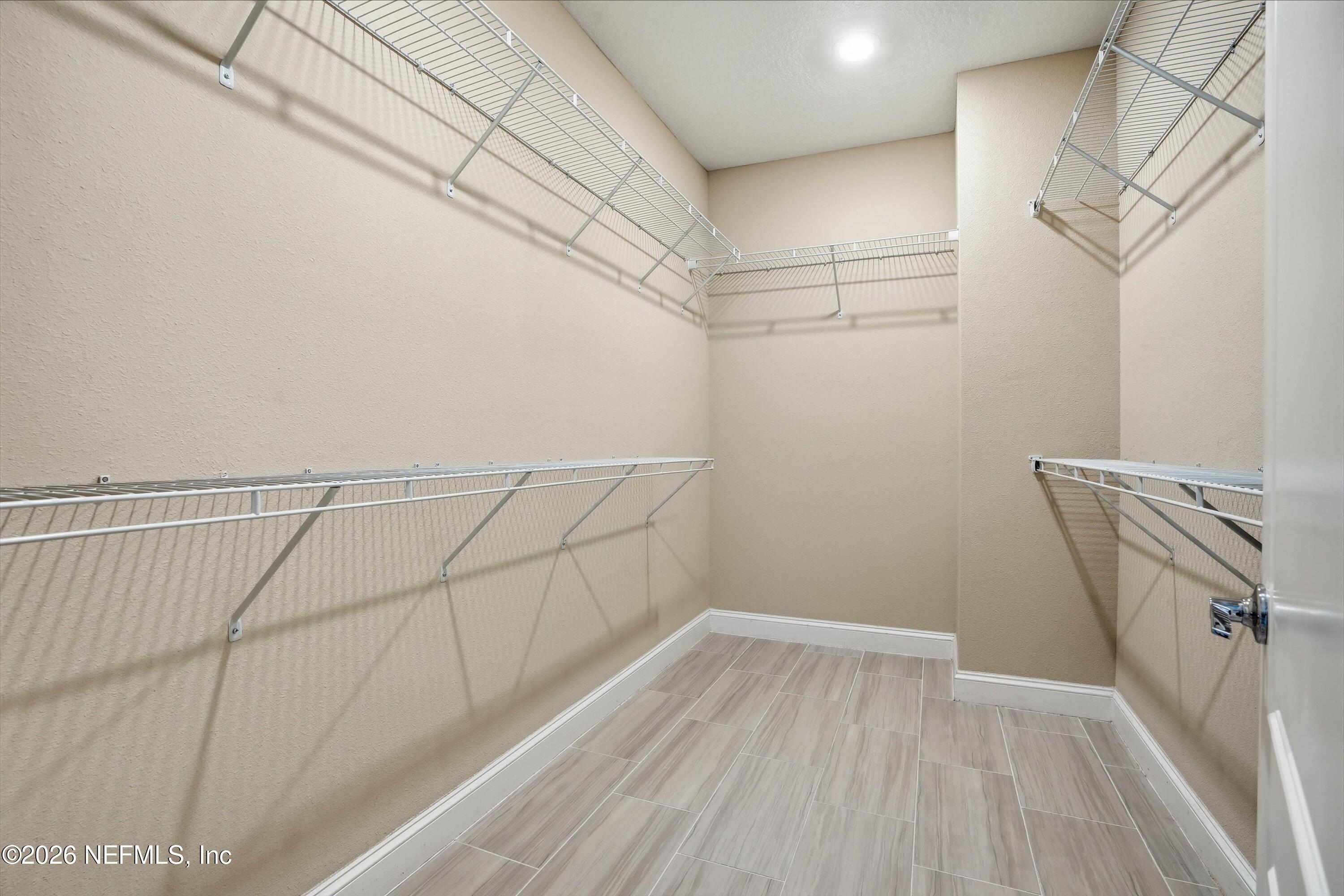 309 Coco Point St. Augustine, FL 32092 - Photo 23 of 50 a view of a room with racks on the wall