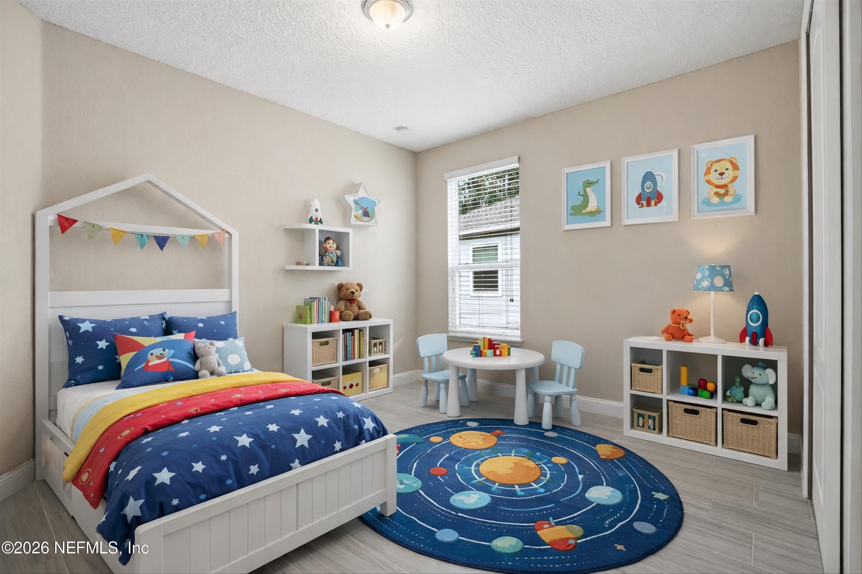 309 Coco Point St. Augustine, FL 32092 - Photo 28 of 50 a bedroom with a bed and a wooden floor