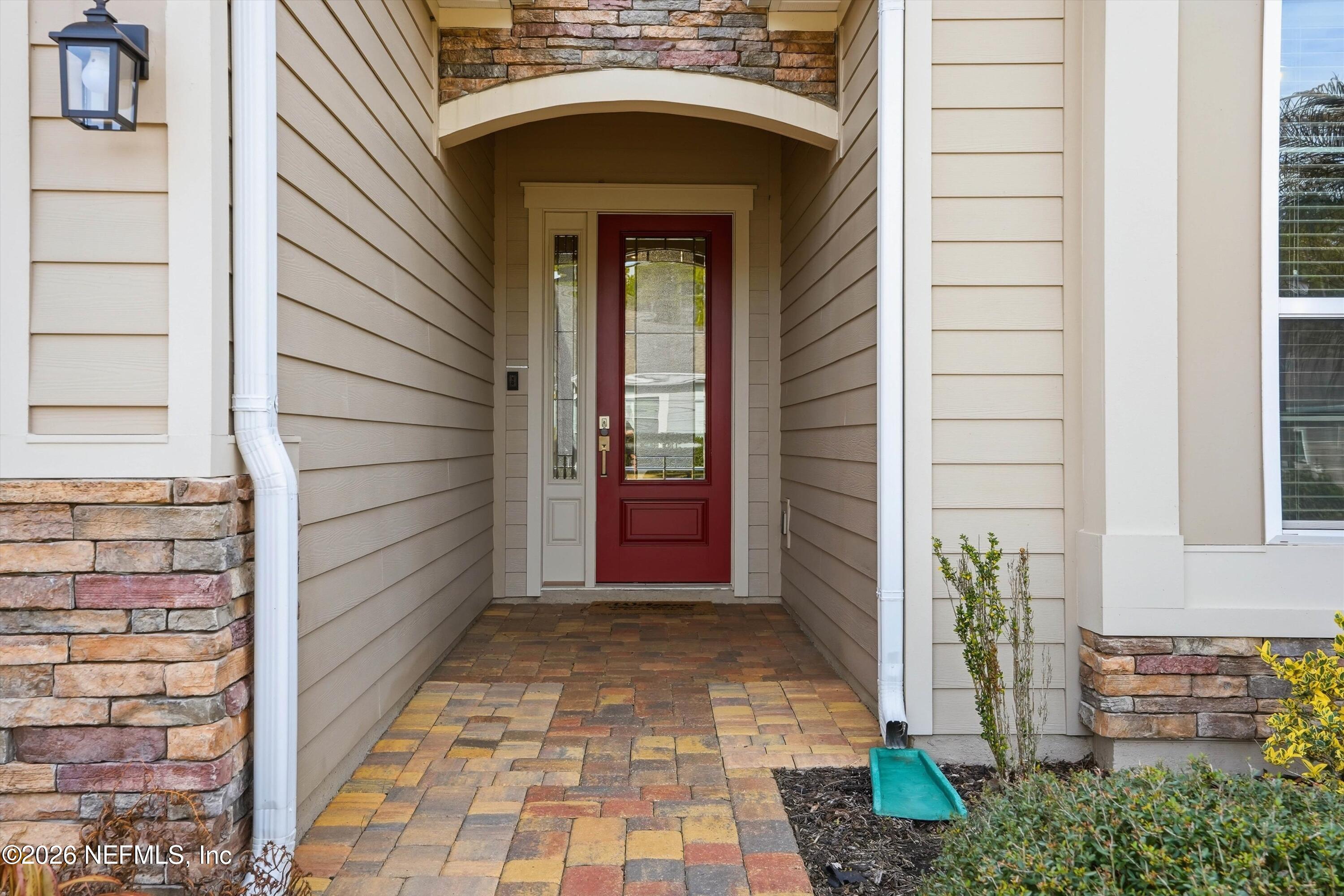 309 Coco Point St. Augustine, FL 32092 - Photo 3 of 50 a view of front door of a house