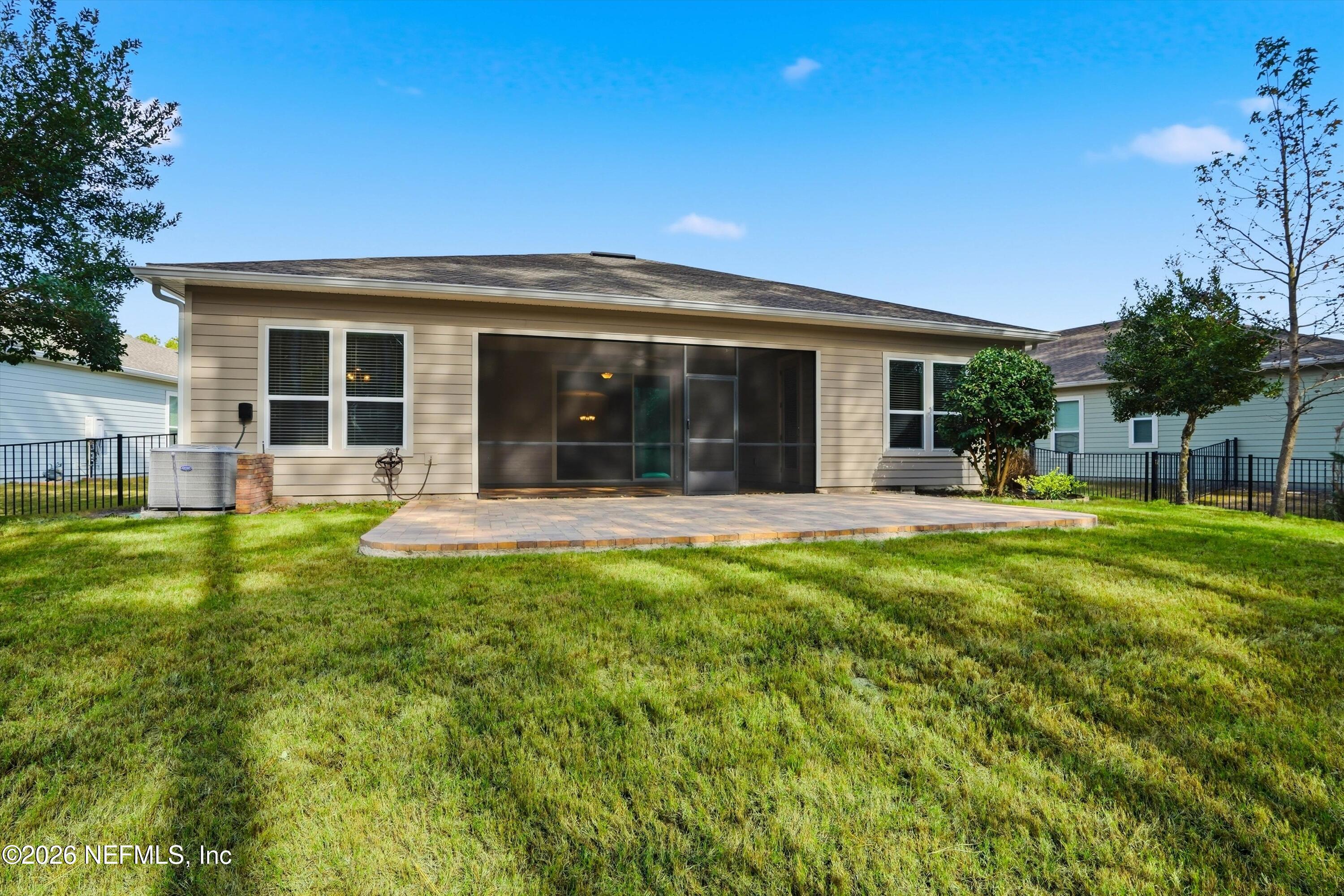 309 Coco Point St. Augustine, FL 32092 - Photo 36 of 50 a view of a house with backyard and porch