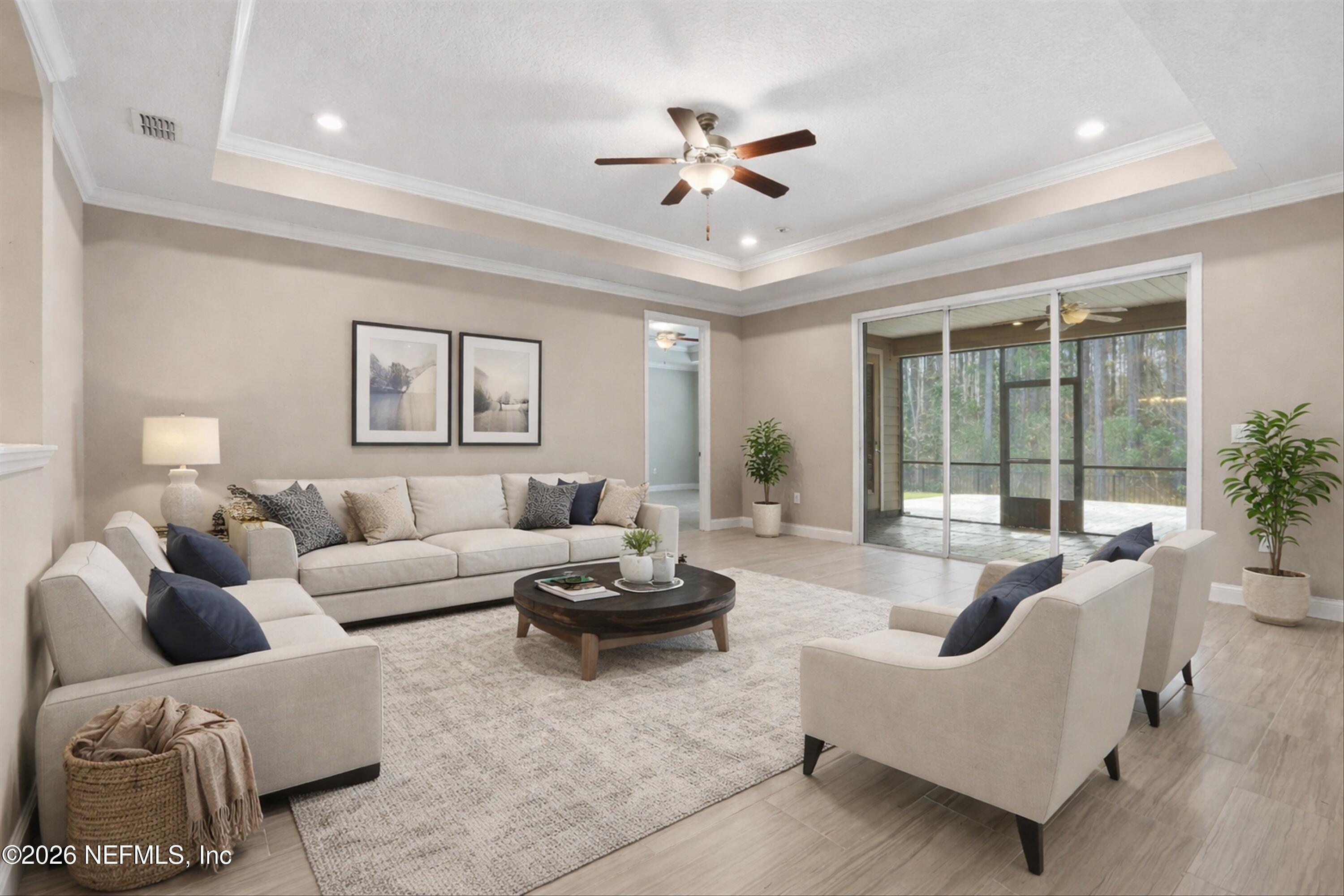 309 Coco Point St. Augustine, FL 32092 - Photo 8 of 50 a living room with furniture and a large window