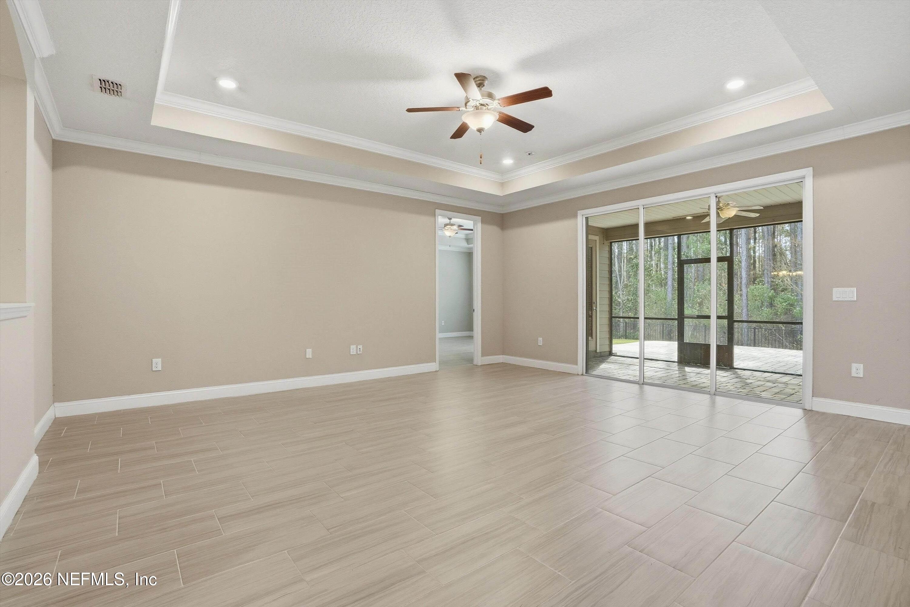 309 Coco Point St. Augustine, FL 32092 - Photo 9 of 50 a view of an empty room with a window