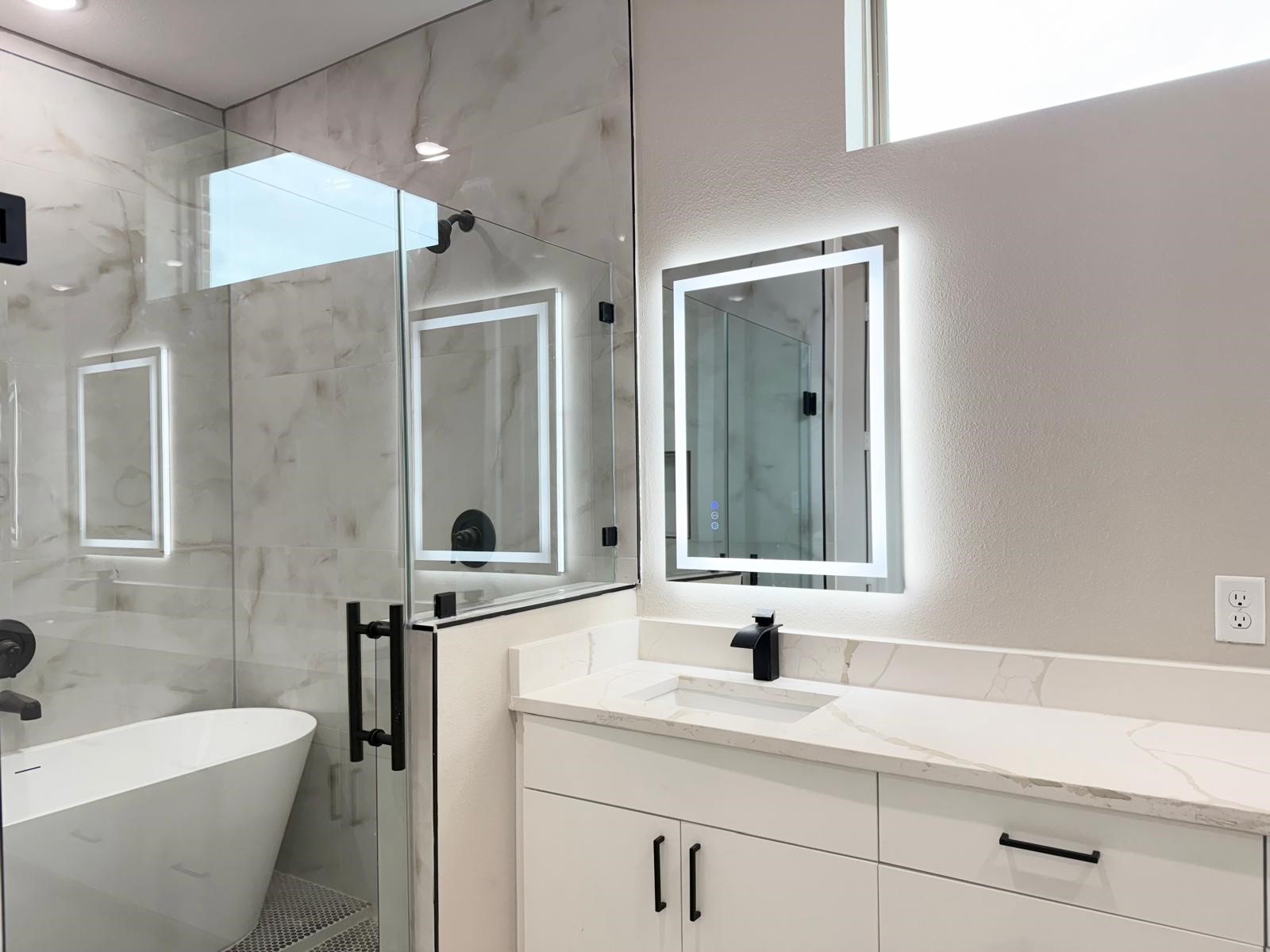 2615 Liguria Ln Spring Spring, TX 77388 - Photo 14 of 29 a bathroom with a sink a toilet a mirror and shower