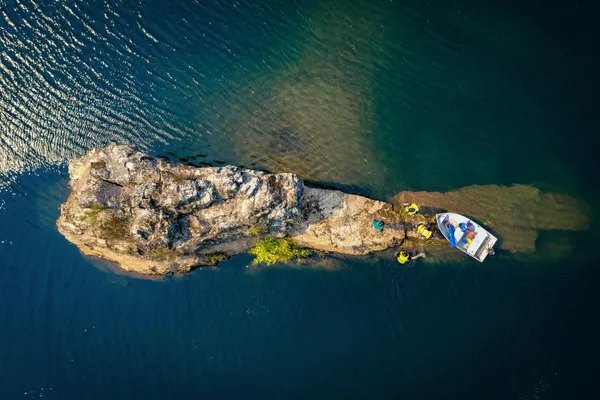 a view of a lake with a mountain in the background