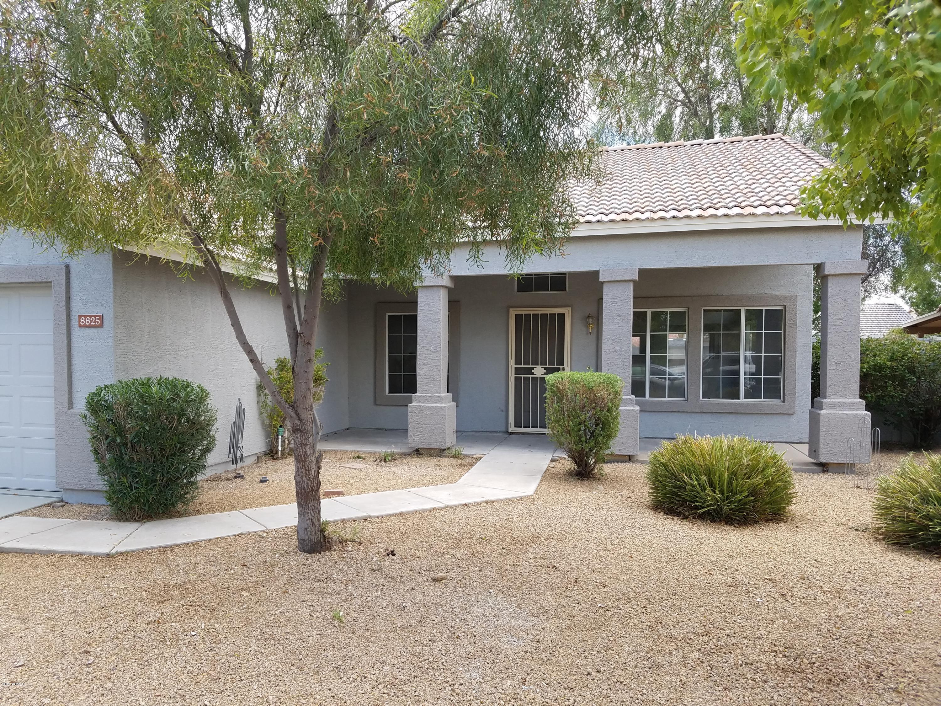 8825 West Monte Vista Road Phoenix, AZ 85037 - Photo 1 of 24 Front