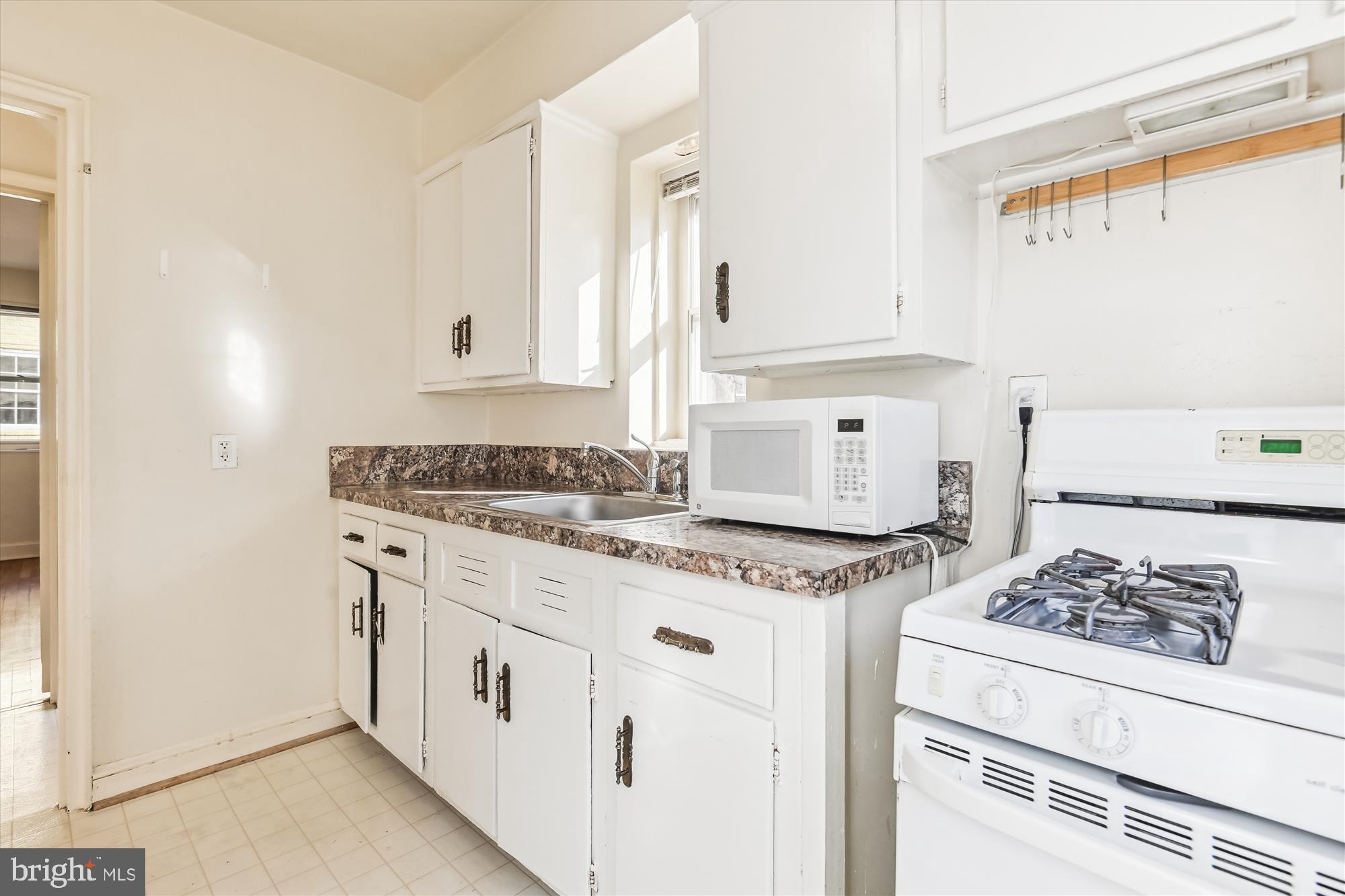 2604 Ross Road Chevy Chase, MD 20815 - Photo 10 of 53 Galley Kitchen with Gas Stove