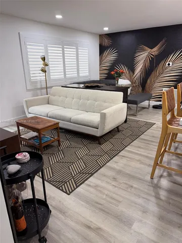 a view of workspace with wooden floor