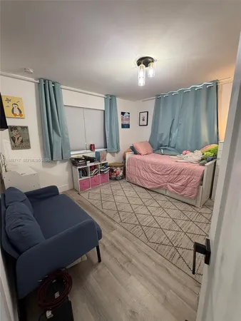 a view of house with outdoor space and garden