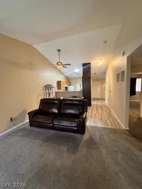 117 Tapatio Street Henderson, NV 89074 - Photo 10 of 14 This inviting living room features warm lighting, offering comfort and style.