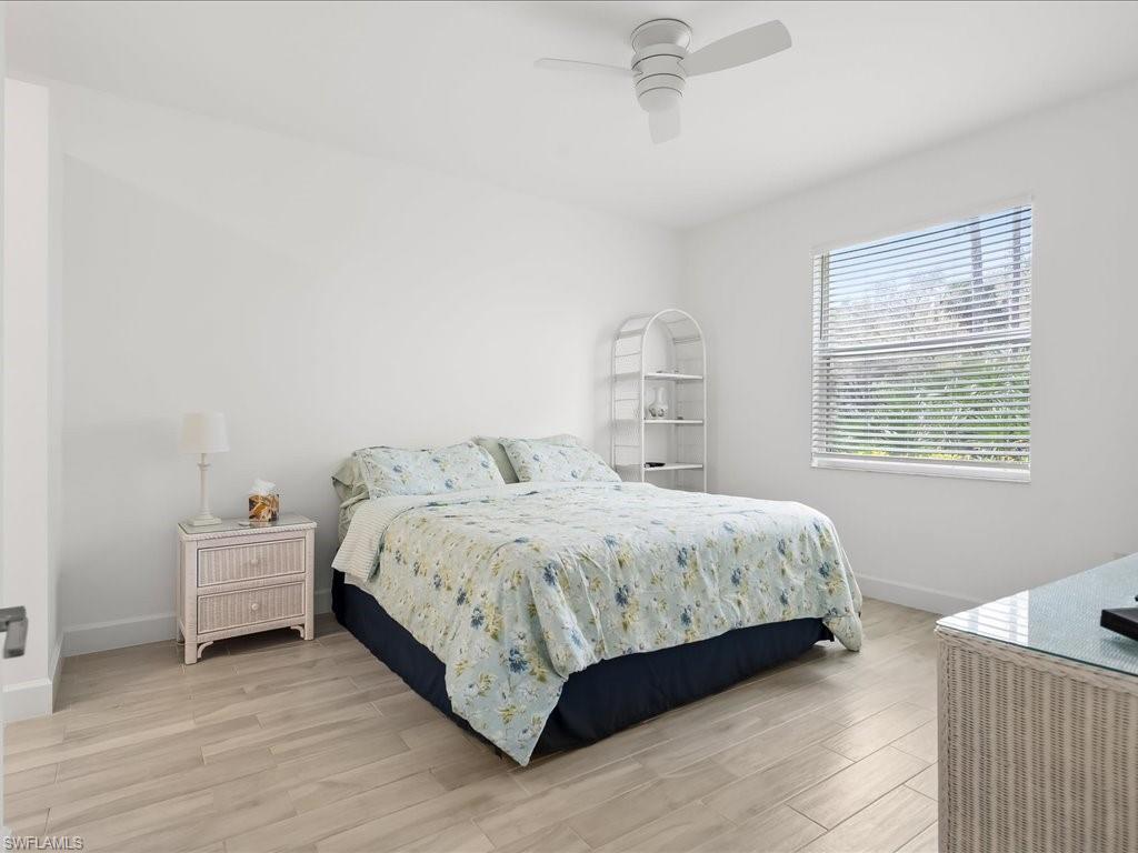 501 Robin Hood Circle, Unit 101 Naples, FL 34104 - Photo 11 of 25 Master Bedroom