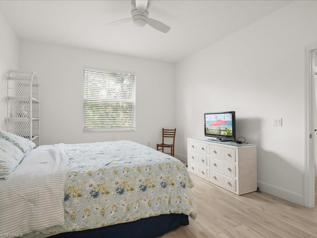 501 Robin Hood Circle, Unit 101 Naples, FL 34104 - Photo 12 of 25 Master Bedroom
