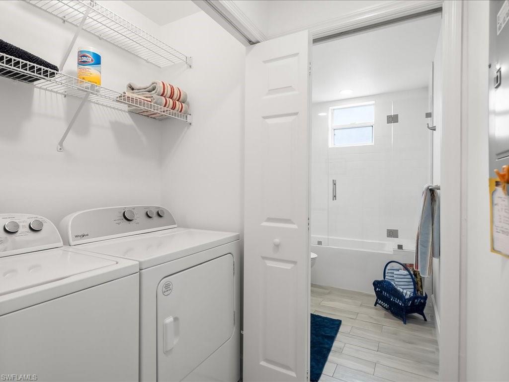 501 Robin Hood Circle, Unit 101 Naples, FL 34104 - Photo 19 of 25 Laundry Closet