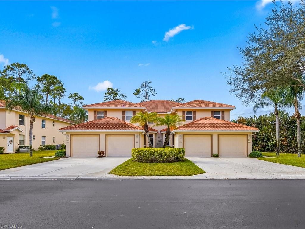 501 Robin Hood Circle, Unit 101 Naples, FL 34104 - Photo 2 of 25 Front of Building