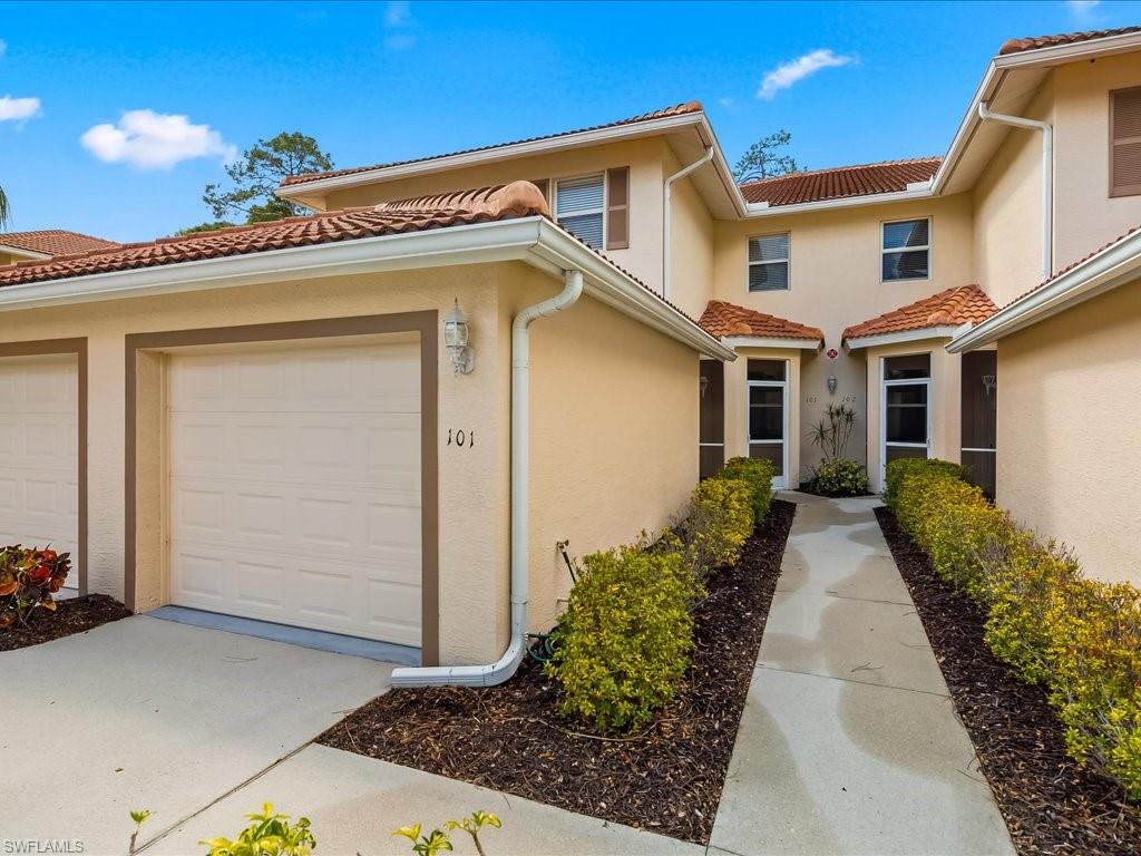 501 Robin Hood Circle, Unit 101 Naples, FL 34104 - Photo 23 of 25 Front of Building