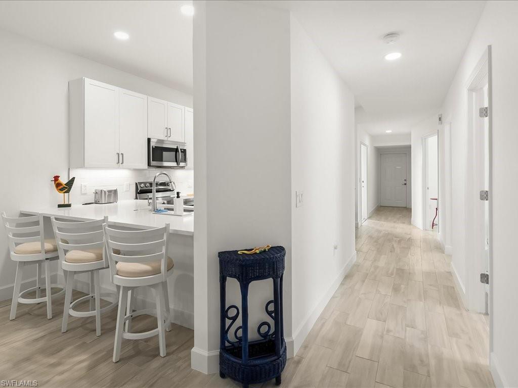 501 Robin Hood Circle, Unit 101 Naples, FL 34104 - Photo 6 of 25 Remodeled Kitchen