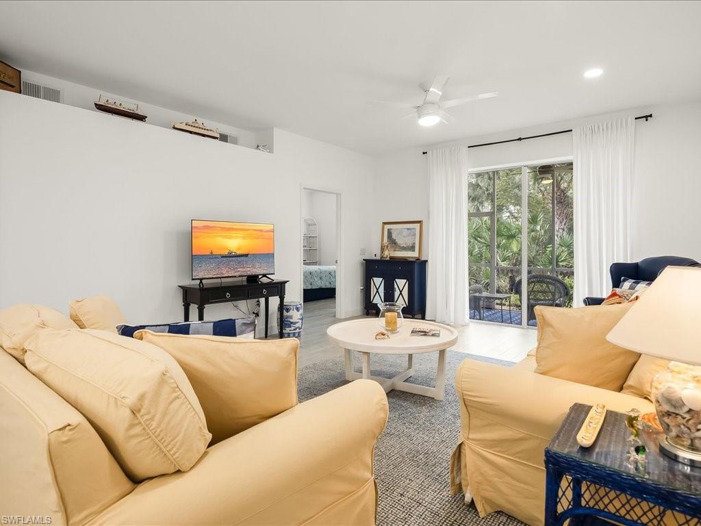 501 Robin Hood Circle, Unit 101 Naples, FL 34104 - Photo 8 of 25 Living Room