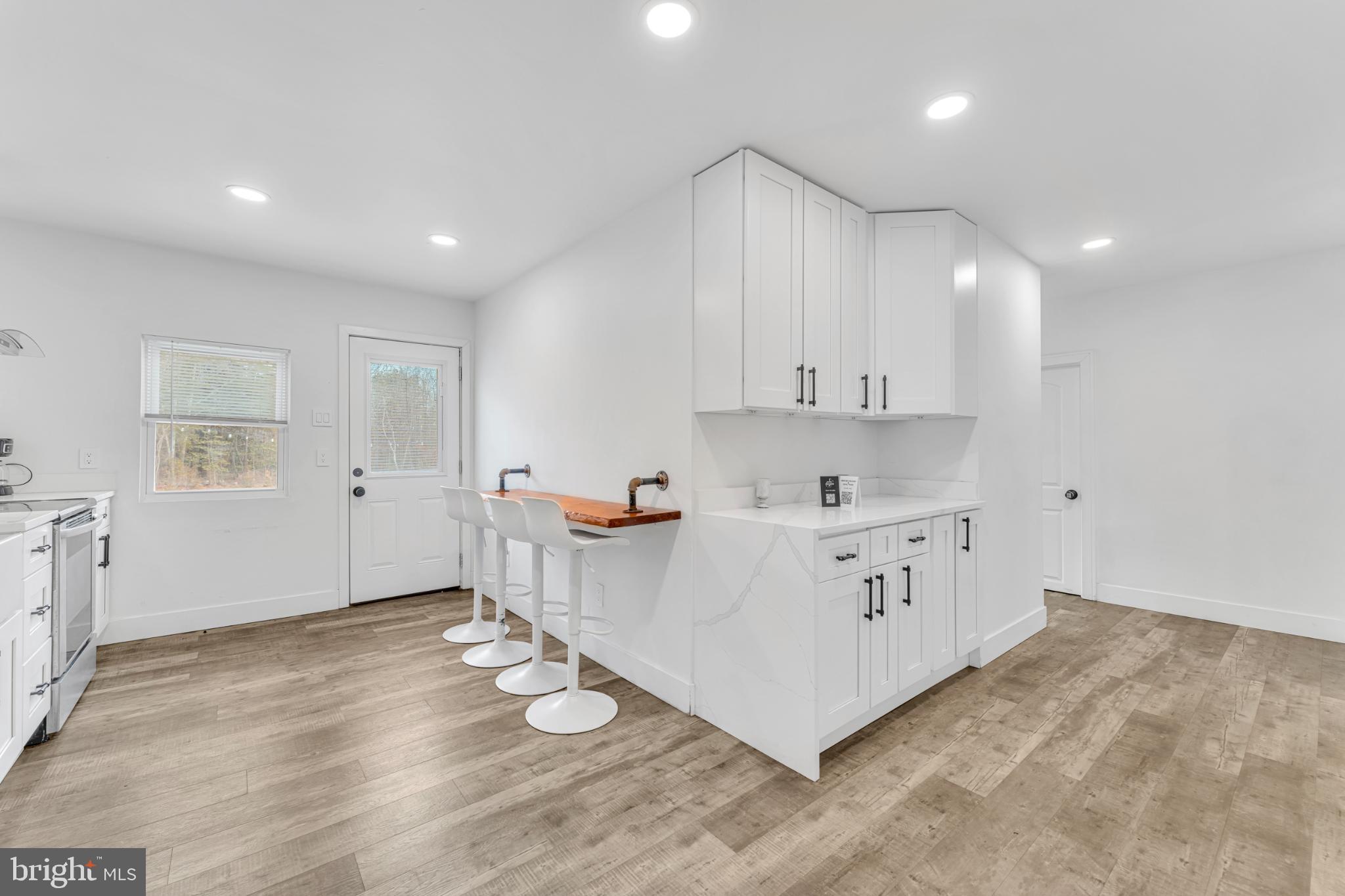 572 Zoe Road Sicklerville, NJ 08081 - Photo 18 of 40 Bright and airy modern kitchen space.