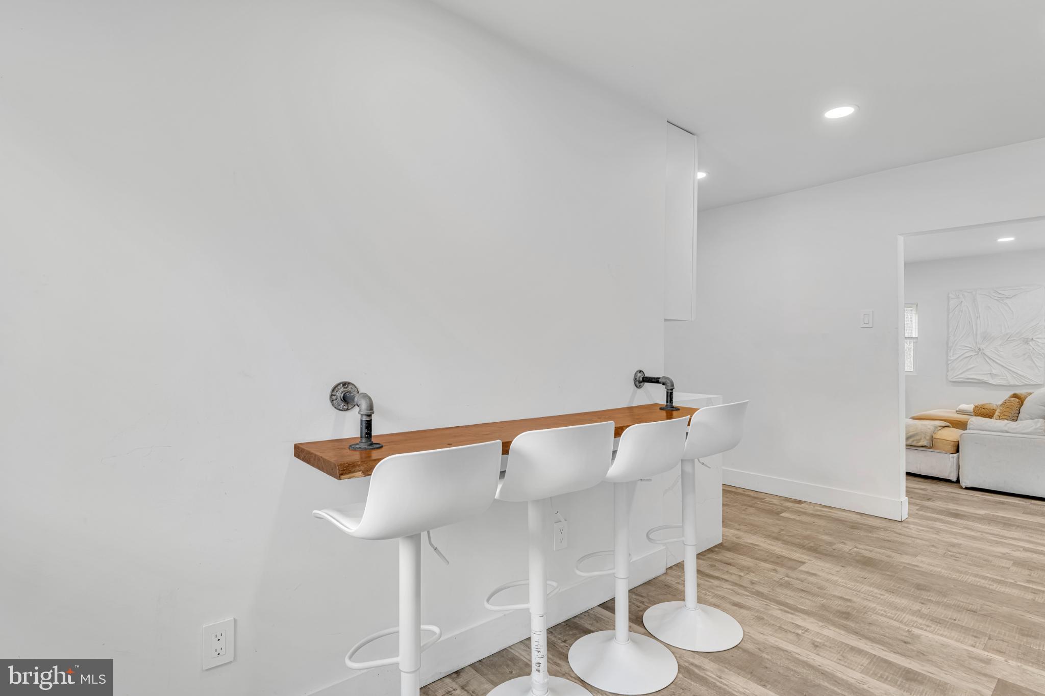 572 Zoe Road Sicklerville, NJ 08081 - Photo 21 of 40 Sleek bar seating for modern living.