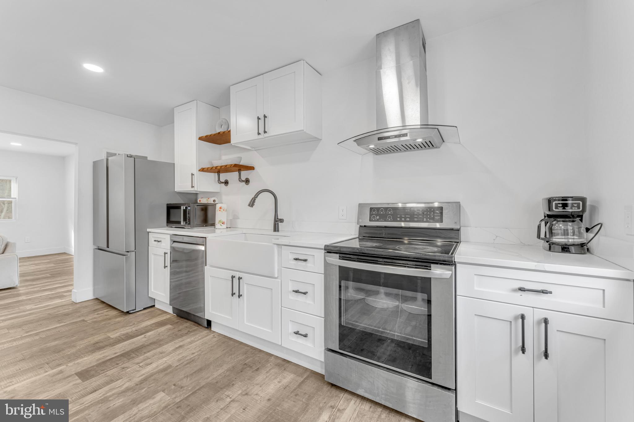 572 Zoe Road Sicklerville, NJ 08081 - Photo 22 of 40 Sleek modern kitchen with elegant finishes.