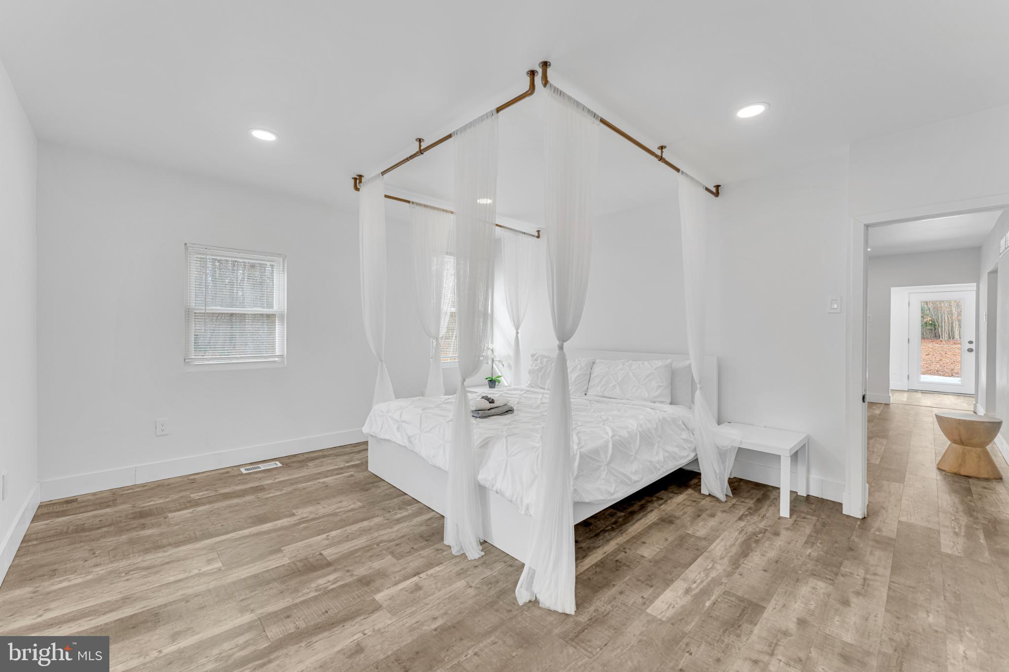572 Zoe Road Sicklerville, NJ 08081 - Photo 26 of 40 Serene bedroom with elegant canopy design.