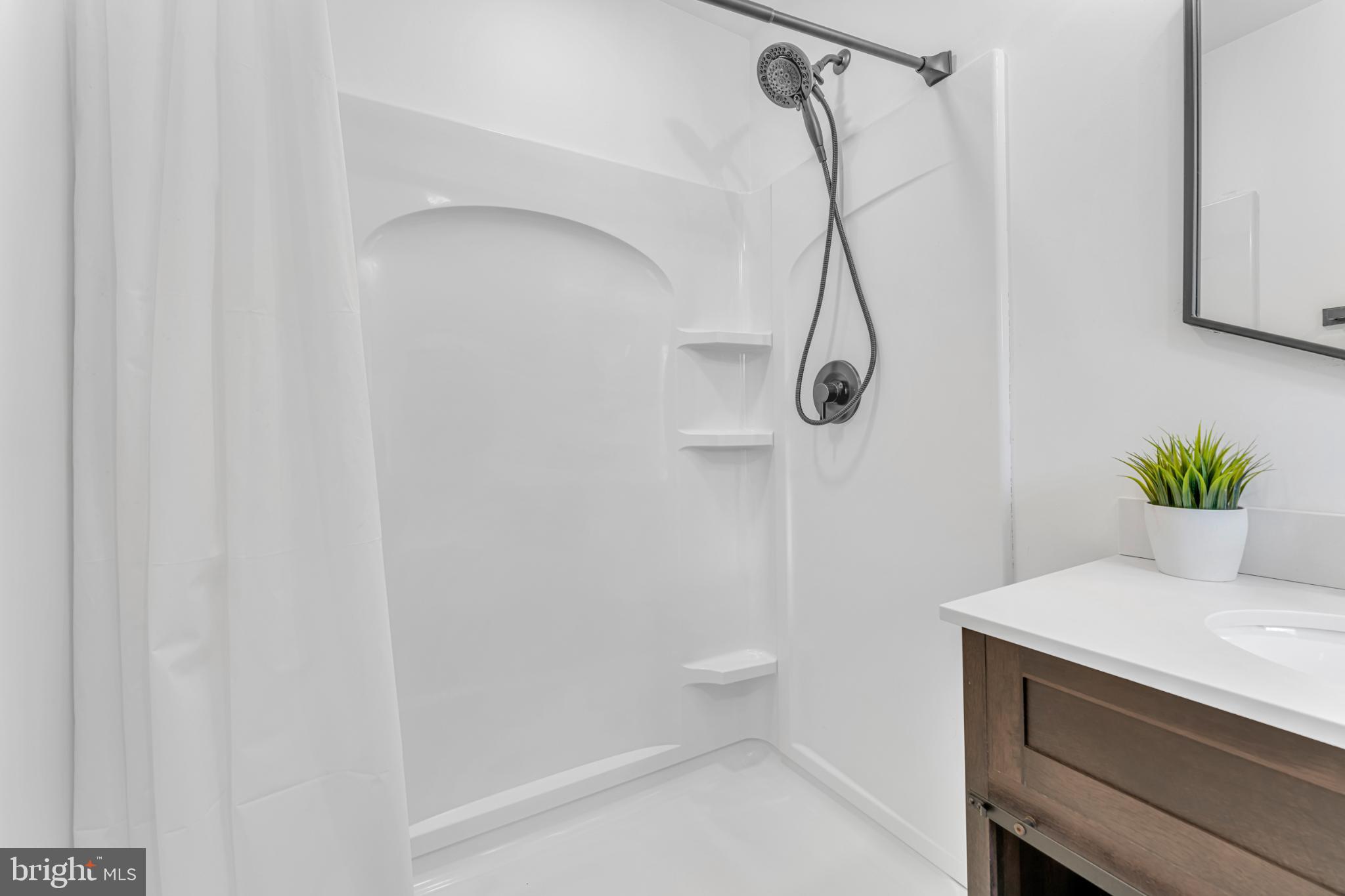 572 Zoe Road Sicklerville, NJ 08081 - Photo 31 of 40 Sleek and modern shower space awaits you.