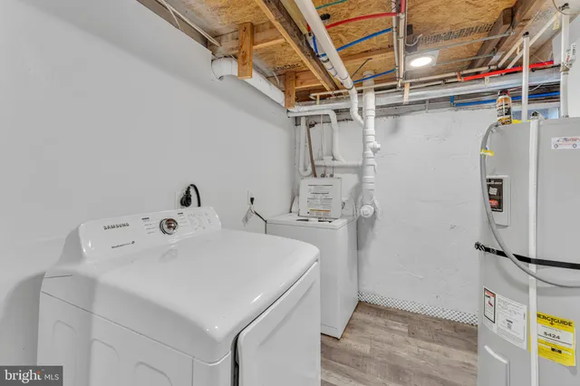 a utility room with dryer and washer