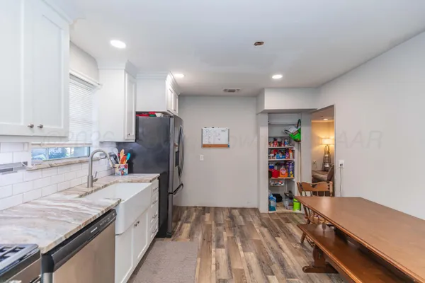 a room with furniture and a window