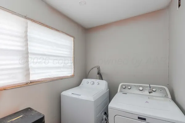 a backyard of a house with seating space