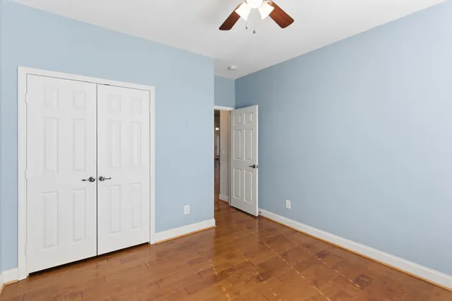 an empty room with fan