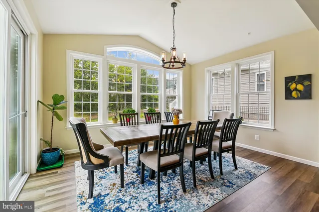 a bed room with a bed and a desk