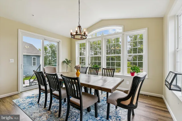 a bedroom with a bed and a desk