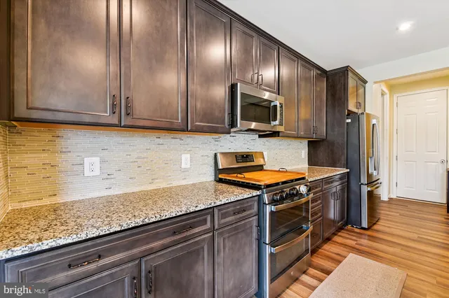 a bed room with furniture and a window