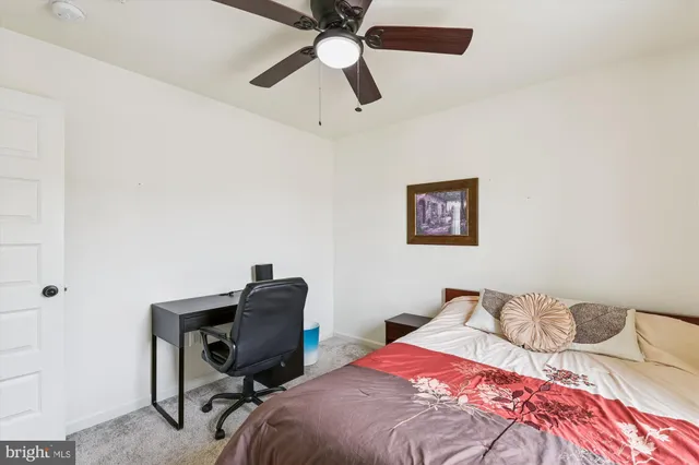 a view of swimming pool with a outdoor seating