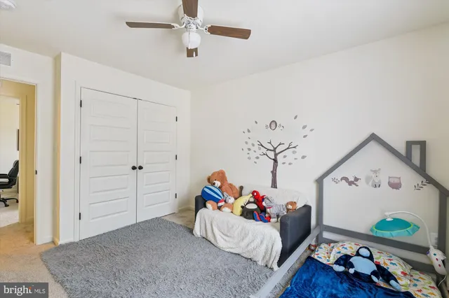 an ocean view with a car park in front of the house