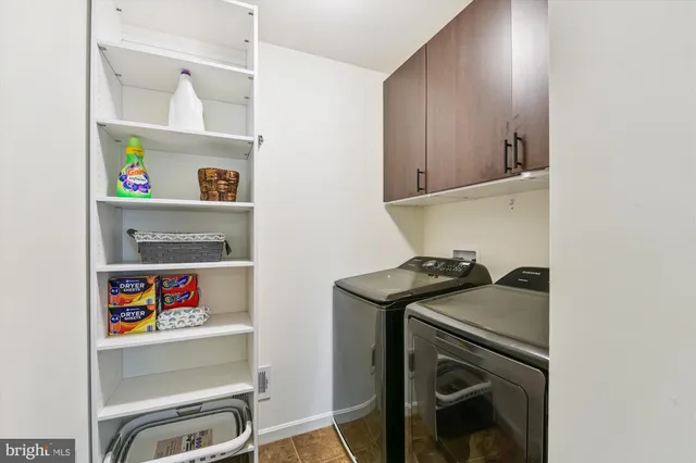 a view of a terrace with furniture and a fire pit