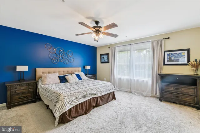 a swimming pool with some trees in the background
