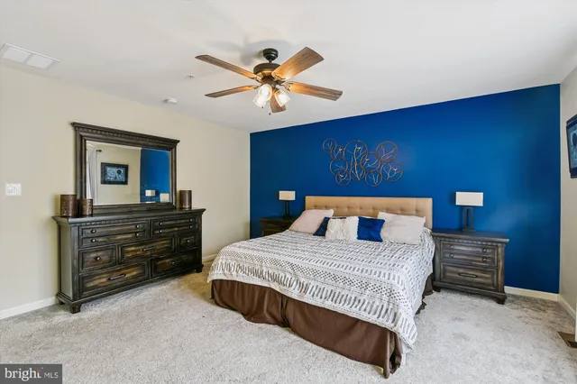 a view of a swimming pool with a lounge chairs
