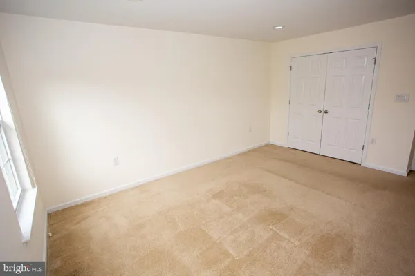 an empty room with an entryway