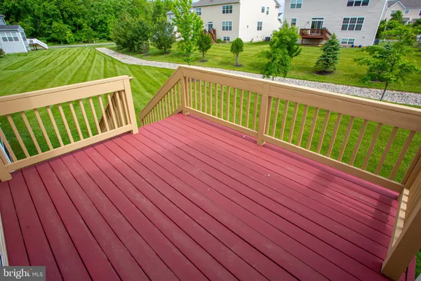 a view of deck with a wooden fence