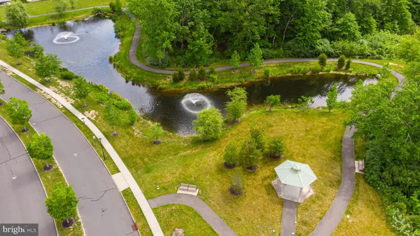 a view of a lake with a yard