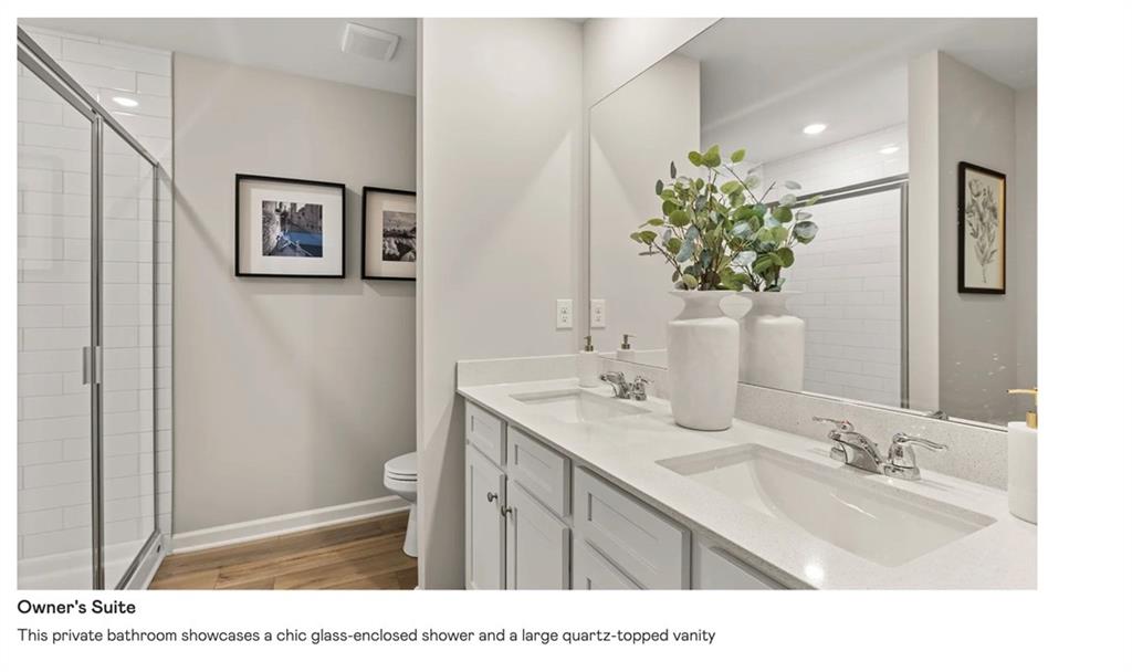 153 Saddlebred Way Rossville, GA 30741 - Photo 14 of 26 a bathroom with a sink a toilet and mirror